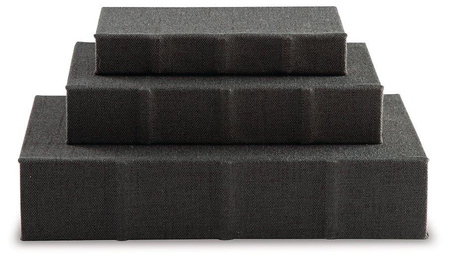 Set of three Ashley Furniture Jolina boxes, rectangular storage boxes with decorative patterns and sturdy construction.