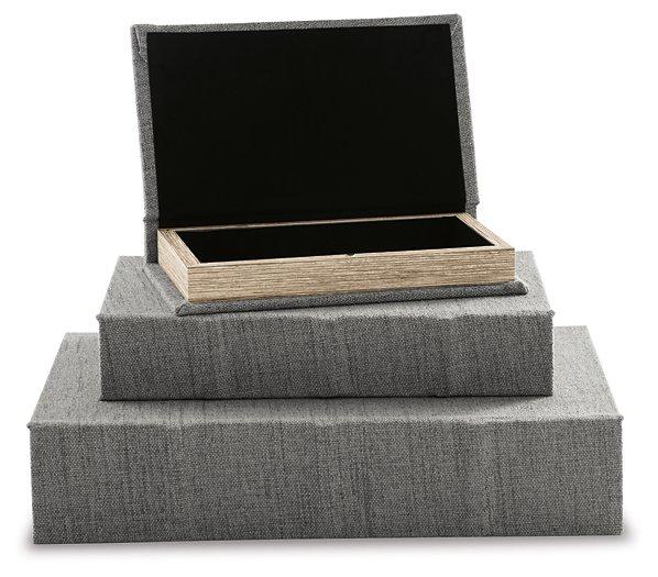 Set of three Ashley Furniture Jolina boxes, rectangular storage boxes with decorative patterns and wooden lids.
