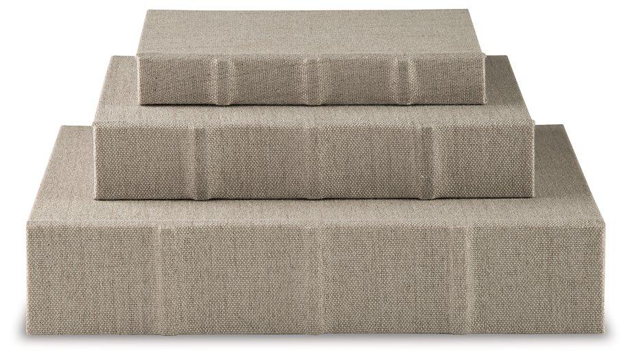 Set of three Ashley Furniture Jolina storage boxes with decorative patterns and sturdy construction.