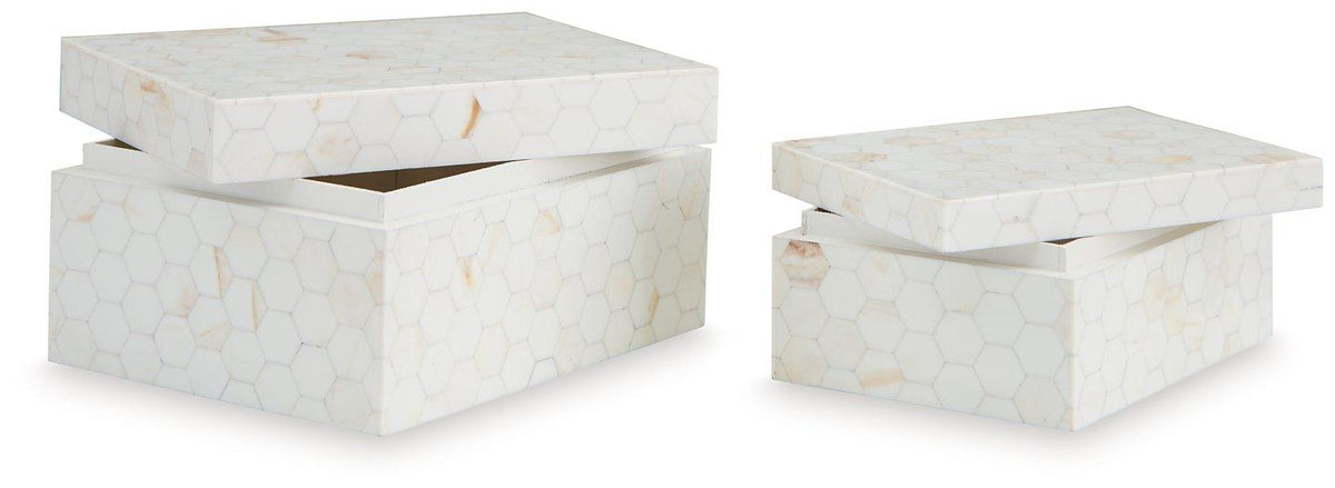 Set of two Ashley Furniture Aldenburg boxes with wood finish and decorative handles for stylish storage and organization.