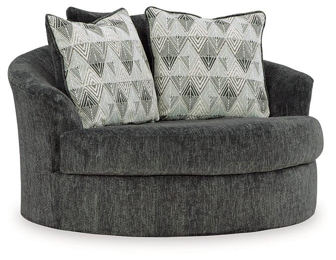 Oversized Ashley Furniture Biddeford swivel accent chair with plush fabric and modern design, perfect for living room decor.