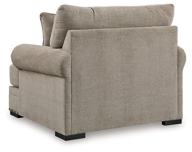 Oversized Ashley Furniture Galemore chair with plush fabric and wide armrests, perfect for a cozy living room.