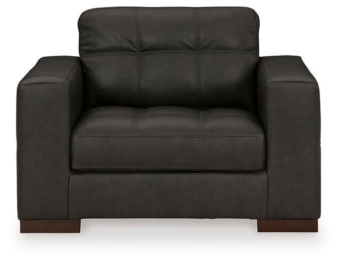 Ashley Furniture Luigi oversized chair with plush fabric and wide armrests, perfect for a comfortable living room seating area.