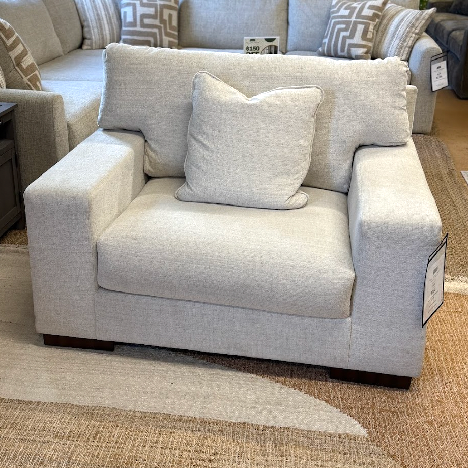 Ashley Furniture Newport oversized chair with plush upholstery and wide armrests, perfect for a modern living room.