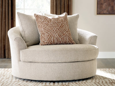 Ashley Furniture Steelwater Retreat oversized swivel accent chair with plush upholstery and rounded armrests.