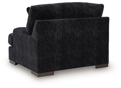 Ashley Furniture Whitmore Manor oversized chair with plush upholstery and a high back, shown from the rear angle.