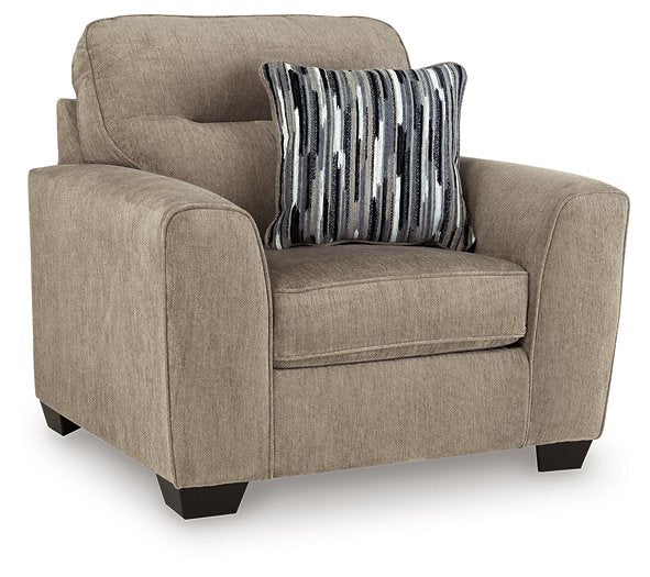 Ashley Furniture Olten oversized chair with plush upholstery and wide armrests, shown from an angled side view.