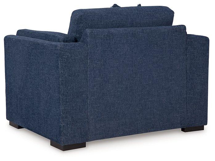 Ashley Furniture Evansley oversized chair with plush upholstery and wide armrests, perfect for a modern living room.