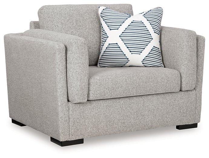 Oversized Ashley Furniture Evansley chair with plush fabric and wide armrests, perfect for a modern living room.