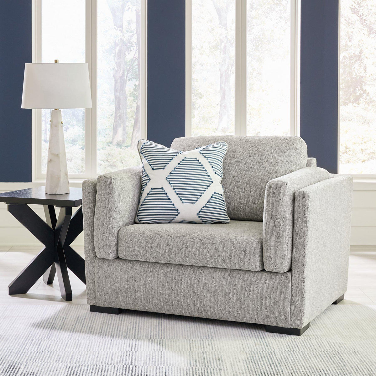 Ashley Furniture Evansley oversized chair with plush fabric, wide armrests, and a comfortable, modern design for stylish living spaces.