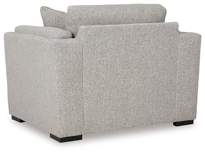 Ashley Furniture Evansley oversized chair with plush upholstery and wide armrests, perfect for a modern living room.
