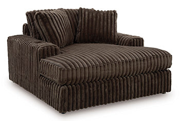 Ashley Furniture Midnight-Madness oversized chaise chair with plush upholstery and wide seating, viewed from an angled perspective.