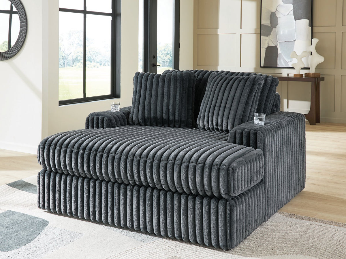 Ashley Furniture Midnight-Madness oversized chaise chair with plush fabric and contemporary design, shown in a cropped image.