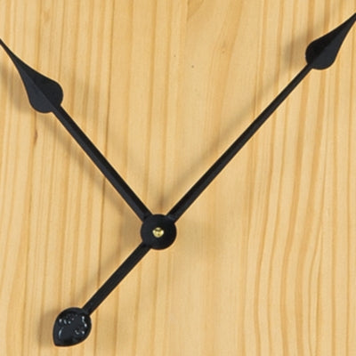 Ashley Furniture Brockett wall clock with a stylish round design and modern black frame.