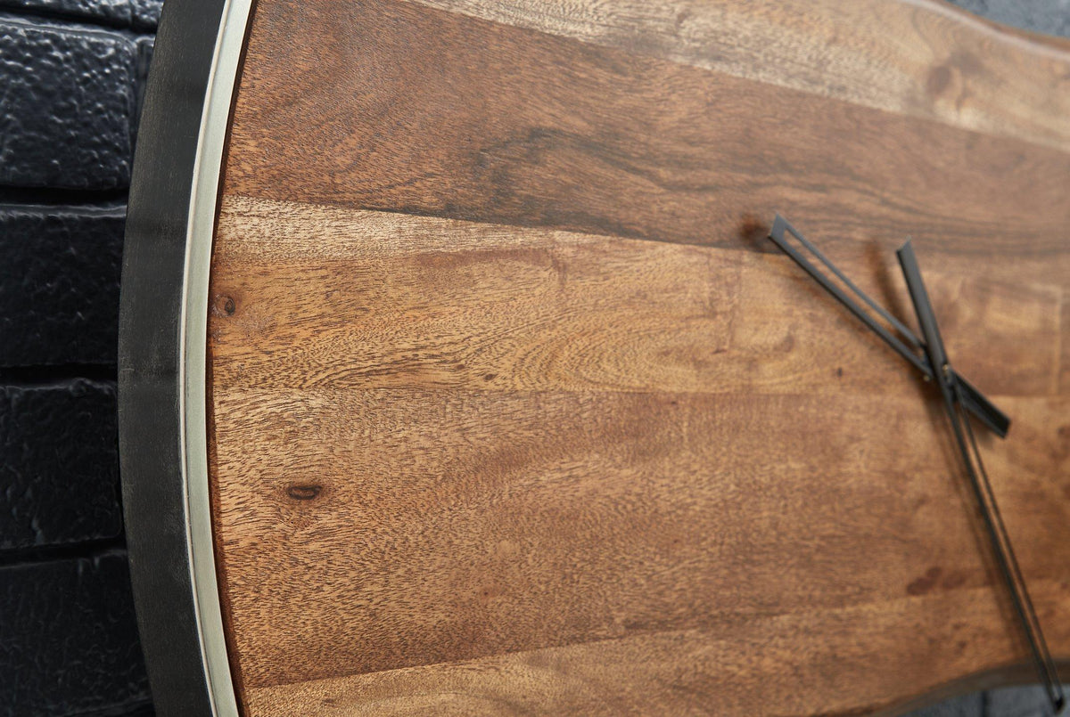 Ashley Furniture Panchali wall clock with a modern design, featuring a round shape and stylish clock face.