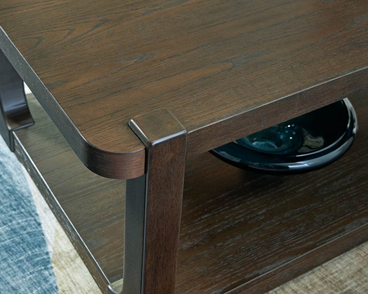 Ashley Furniture Breckington coffee table with a sleek wooden top and sturdy legs, ideal for living room or lounge decor.