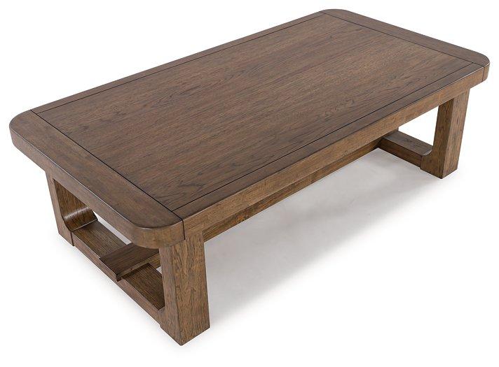 Ashley Furniture Cabalynn coffee table, modern cocktail table with a sleek wooden finish and sturdy design.