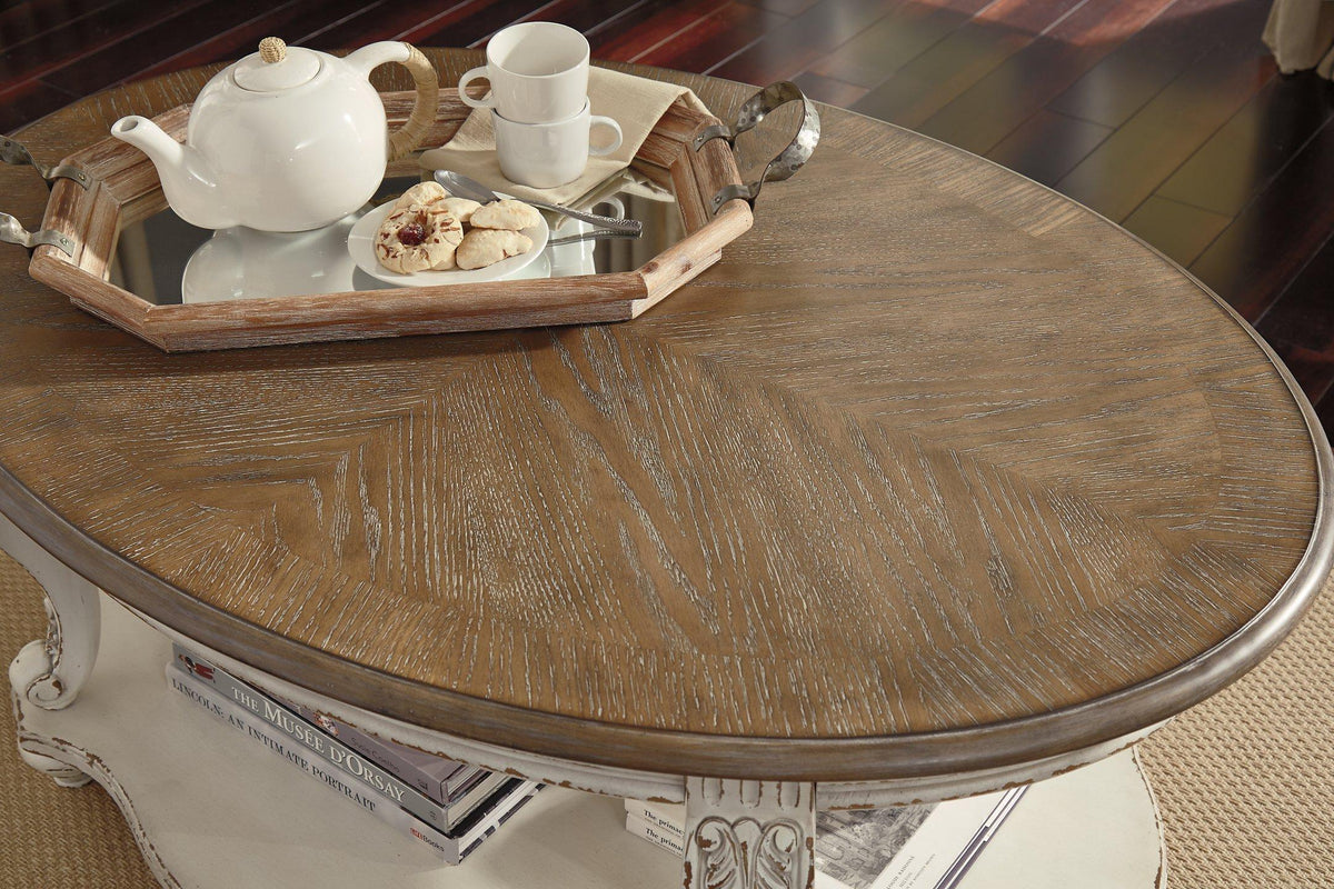 Ashley Furniture Realyn coffee table, modern cocktail table with wooden finish, featuring a spacious top and stylish design.