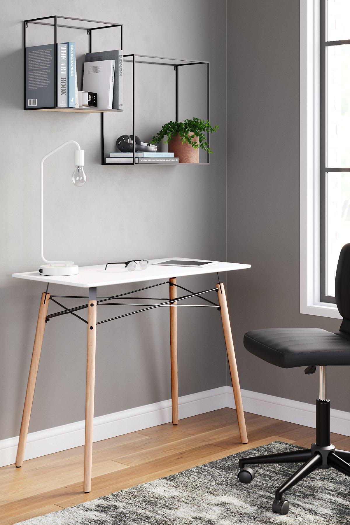 Ashley Jaspeni home office desk with a modern design, featuring a spacious surface and sleek wood finish.