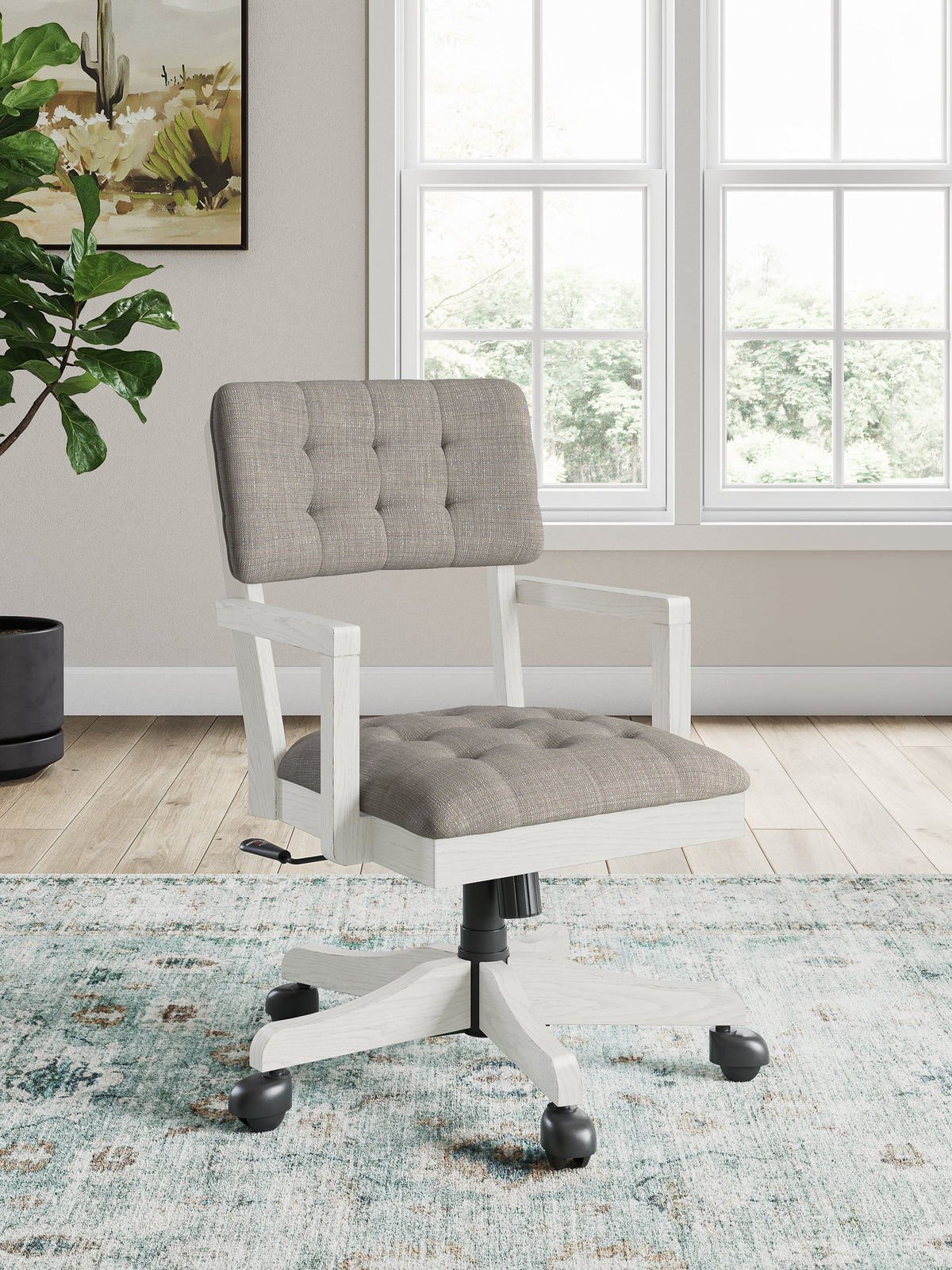 Ashley Furniture Robbinsdale home office desk chair with padded seat and backrest, featuring a modern design and adjustable height.