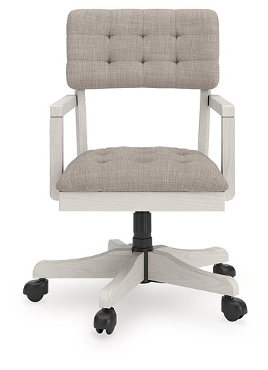 Ashley Furniture Robbinsdale home office desk chair with cushioned seat and backrest, black upholstery, and adjustable height.