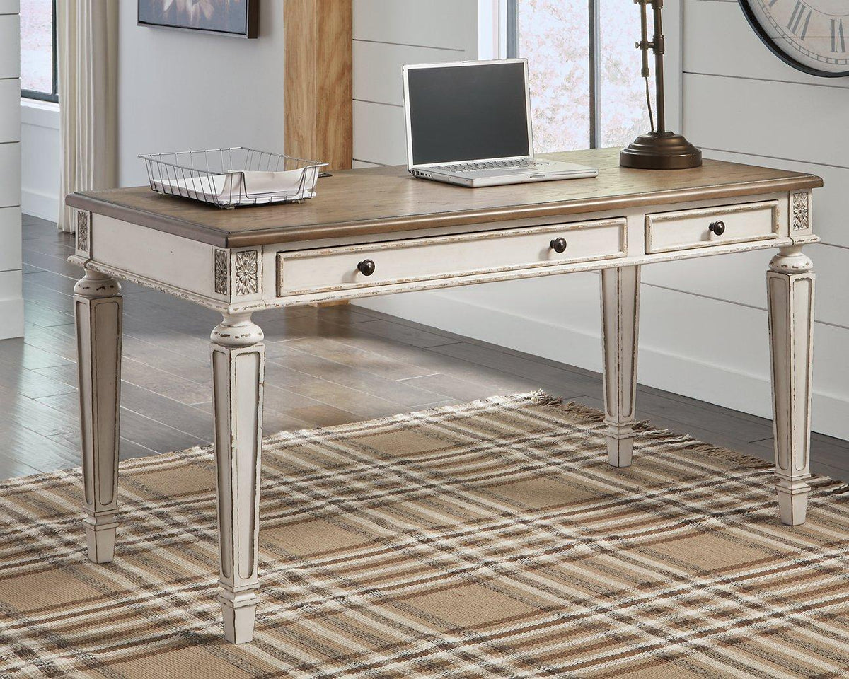 Realyn 2-piece home office desk set by Ashley Furniture featuring a modern wooden desk and matching workspace storage.