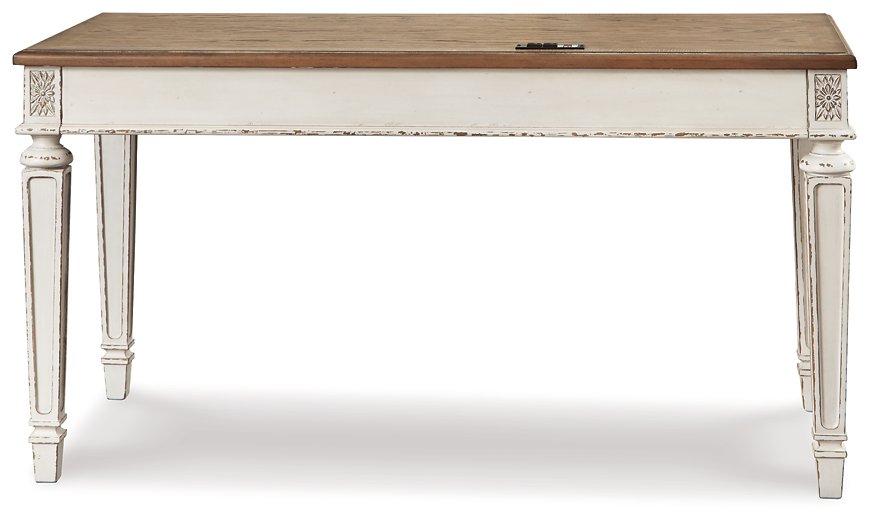 Realyn 2-piece home office desk set by Ashley Furniture, featuring a modern desk with clean lines and spacious workspace.