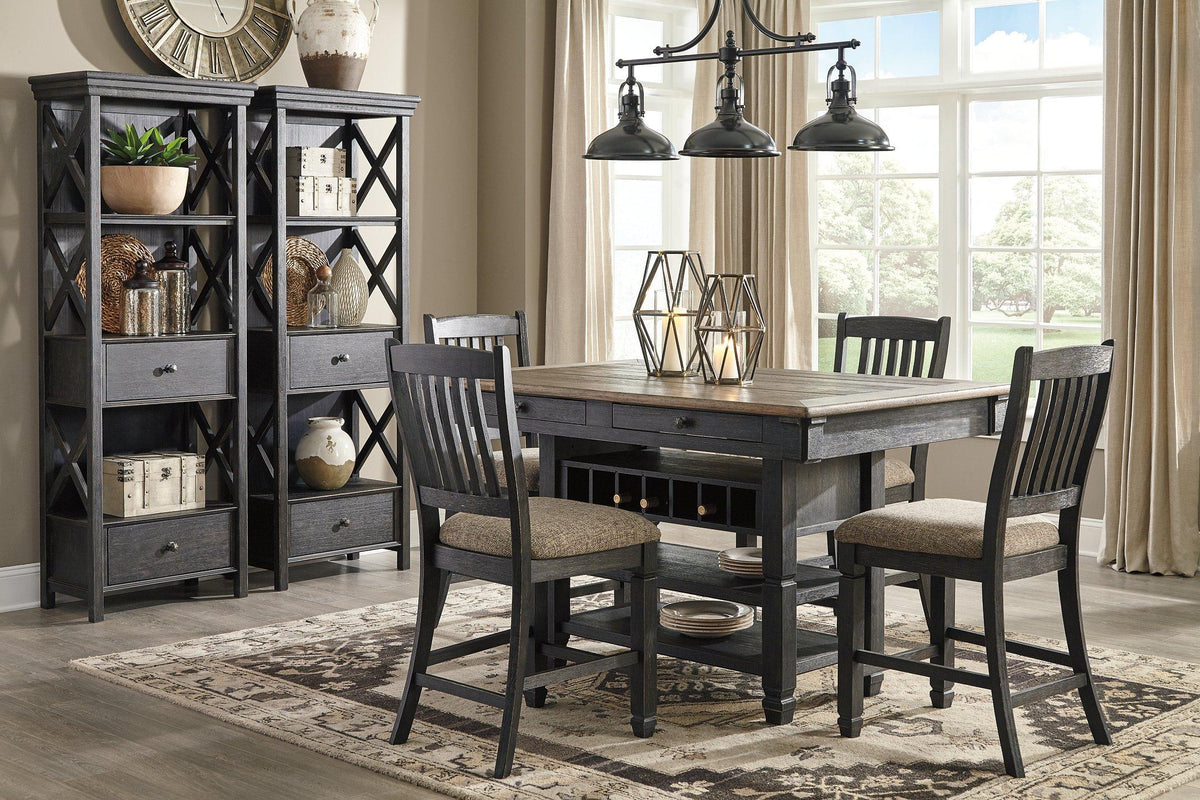 Glass-front Tyler Creek display cabinet by Ashley Furniture with wooden shelves and elegant design for showcasing decor.