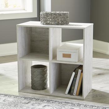 Ashley Furniture Paxberry Four Cube Organizer with open compartments, ideal for stylish storage and organization.