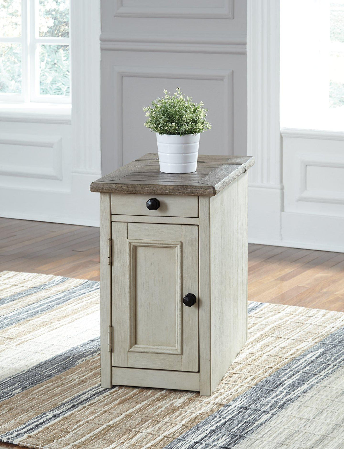 Ashley Furniture Bolanburg chairside end table with USB ports, outlets, and a modern wooden design for convenient side table use.