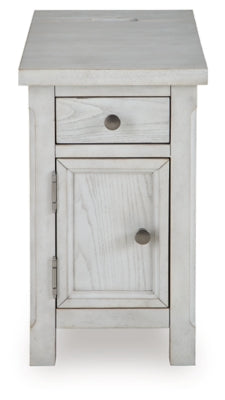 Ashley Furniture Robbinsdale chairside end table with a dark wood finish and a single drawer, shown from a head-on angle.