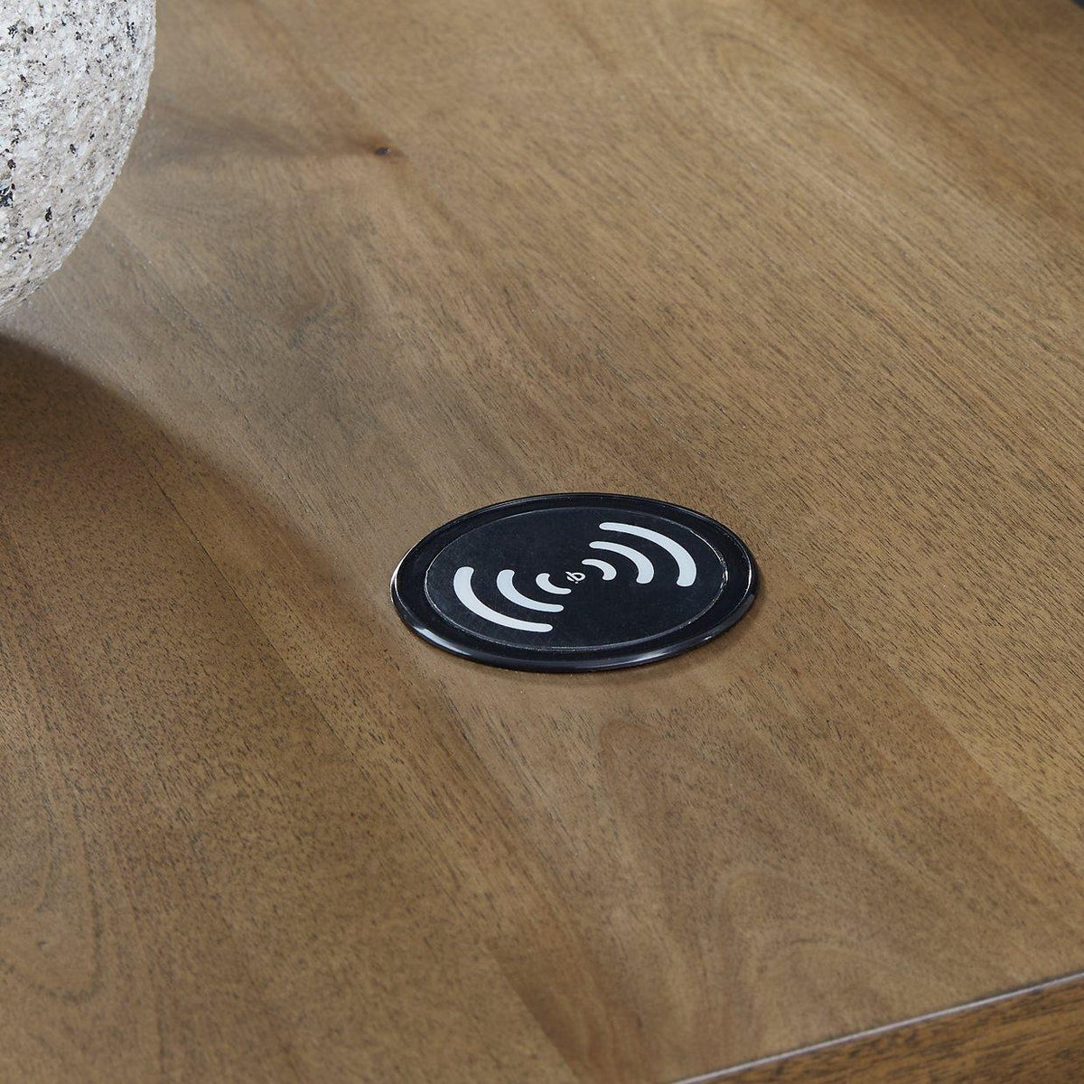 Ashley Furniture Torlanta chairside end table with a wooden top and black metal frame, perfect for living room use.
