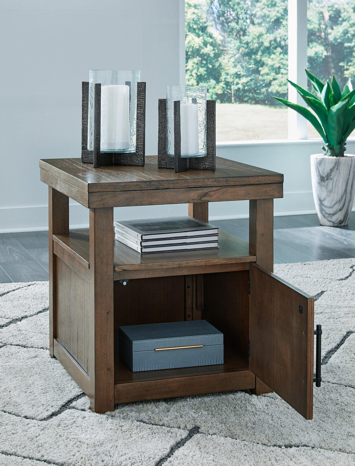 Ashley Furniture Boardernest end table with a sleek wood finish, featuring a spacious tabletop and modern design.