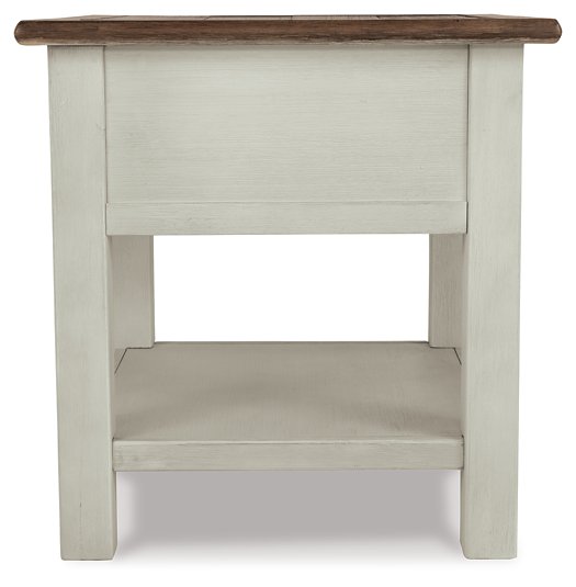 Ashley Furniture Bolanburg End Table with dark wood finish and sleek design, shown from the back angle.