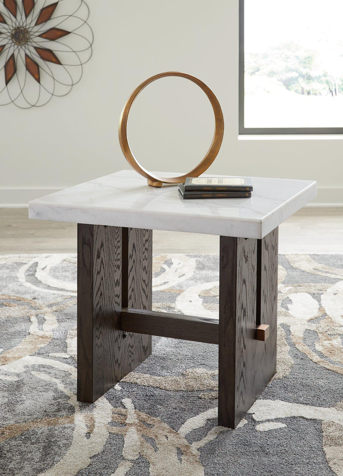 Ashley Furniture Burkhaus End Table featuring a sleek wooden surface and modern design for living room decor.