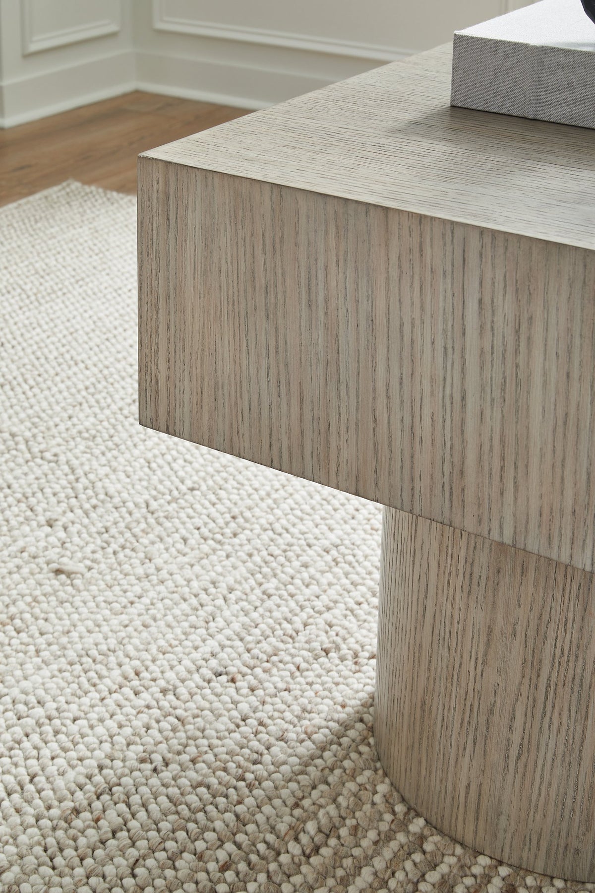 Ashley Furniture Jorielyn End Table with wood finish and modern design, featuring a sturdy tabletop and stylish base.