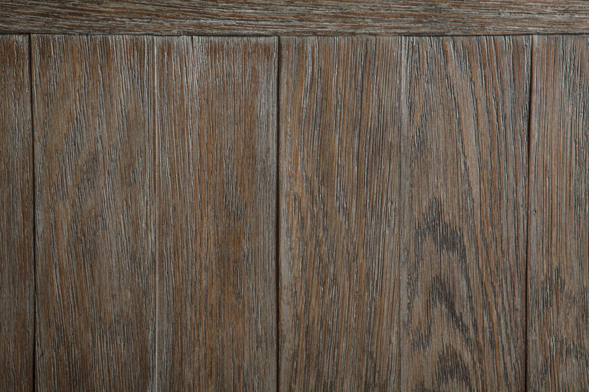 Ashley Furniture Tyler Creek End Table with a wooden finish, featuring a simple rectangular design and sturdy legs.