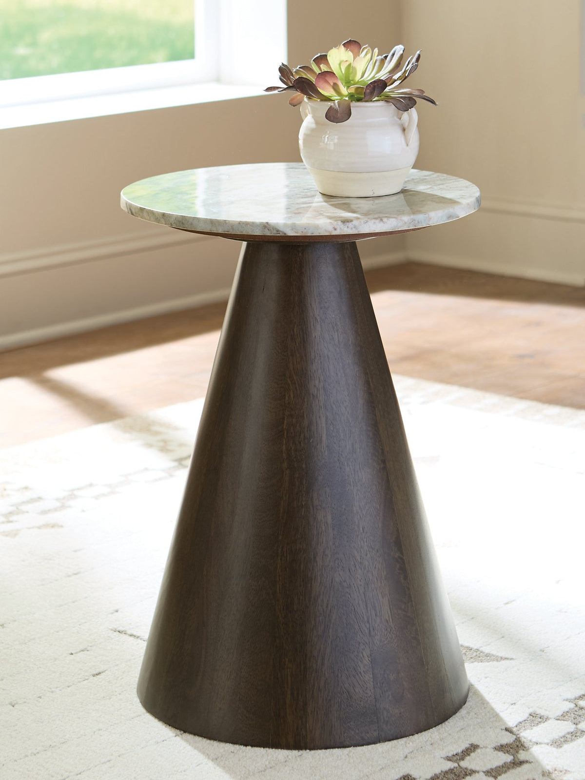 Ashley Furniture Waltnor accent end table with a wooden top and metal legs, showcasing a modern design in a cozy living room.