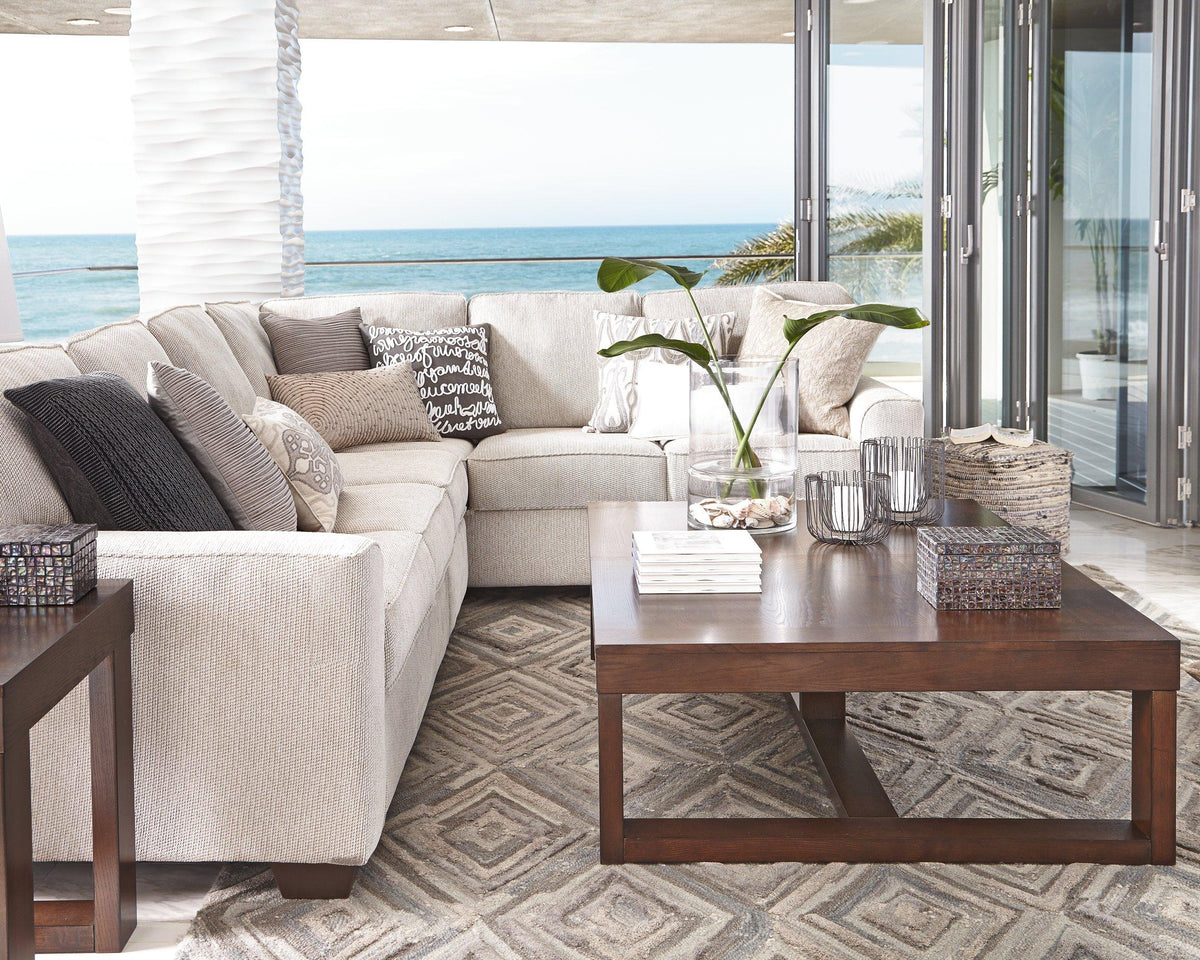 Ashley Furniture Watson End Table with wood finish and modern design, featuring a sturdy surface and sleek legs.