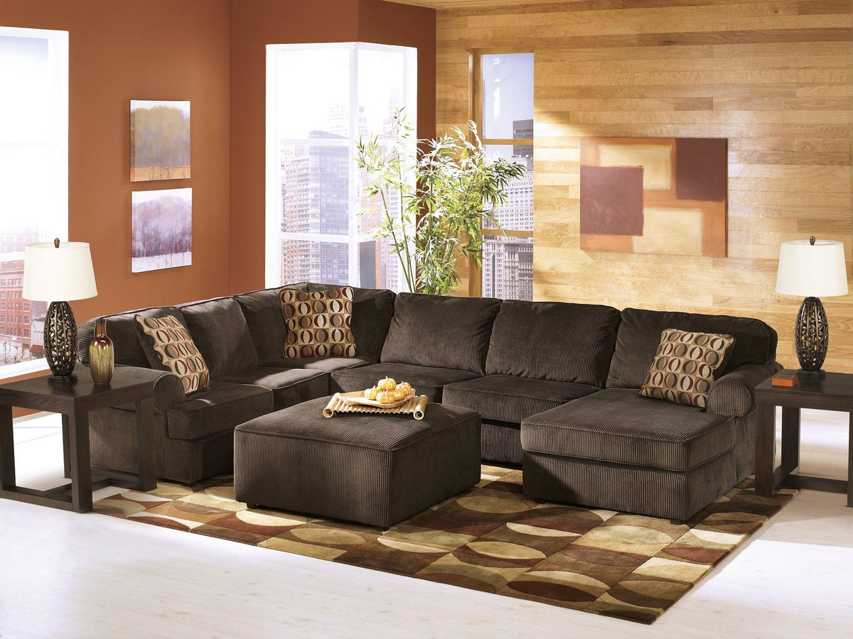 Ashley Furniture Watson End Table with wood finish, featuring a sleek rectangular design and modern metal legs.