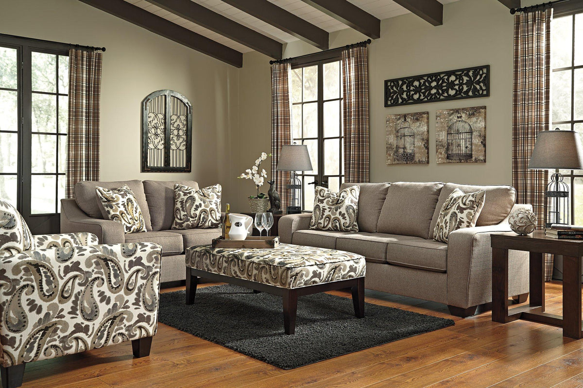 Ashley Furniture Watson End Table with wood finish and modern design, featuring a compact tabletop and storage shelf.