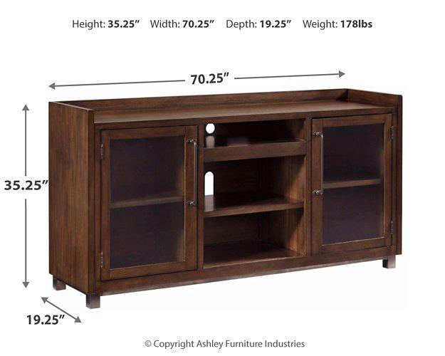 Ashley Furniture Starmore 3-Piece Entertainment Center with TV stand, shelves, and storage cabinets in warm wood finish.