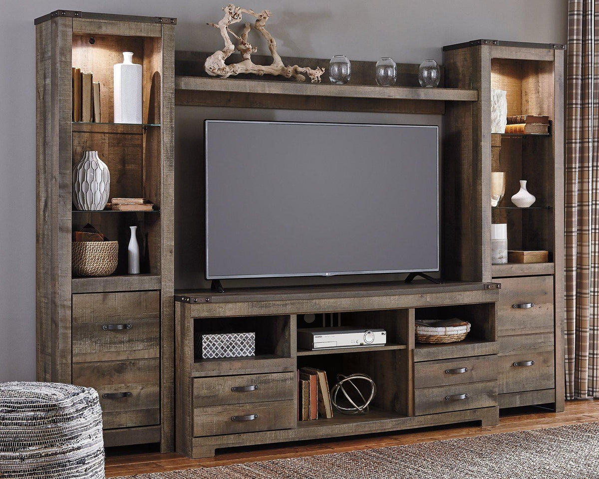 Ashley Trinell 4-piece entertainment center with TV stand, shelving, and storage units in a modern design.
