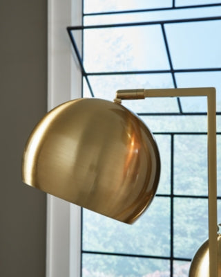 Close-up of the shade detail on the Sorcha Floor Lamp by Ashley Furniture, showcasing the stylish design and fabric texture.