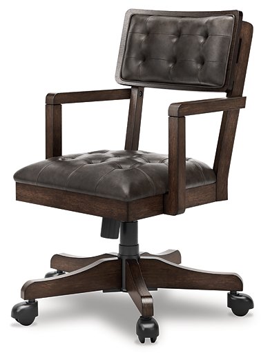Ashley Furniture Breckington Home Office Set with desk and storage cabinet, shown from an angled perspective in a modern home office space.