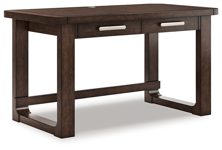 Ashley Furniture Breckington home office set, angled view of desk and storage units in a modern office space.