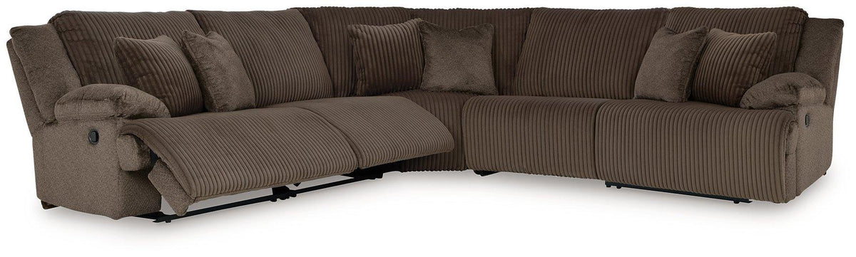 Ashley Furniture Top Tier living room set with sofa, loveseat, and armchair arranged in a modern, stylish living space.