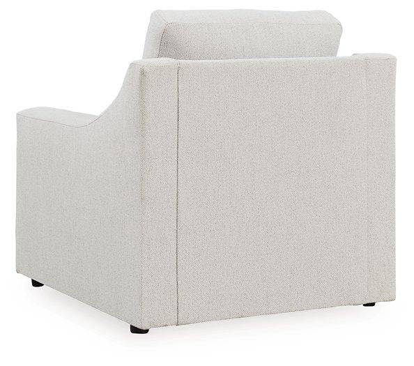 Ashley Furniture Maitelynn upholstery living room set with sofa and armchairs in a modern, cozy living space.