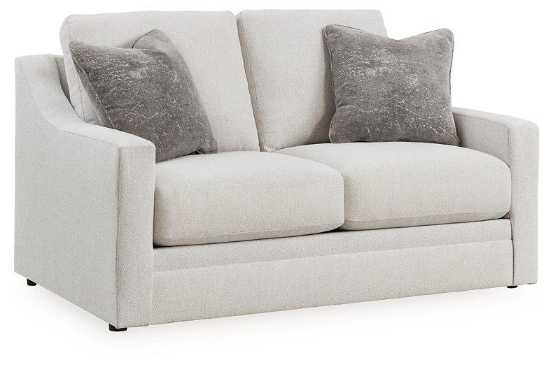 Ashley Furniture Maitelynn upholstery living room set with sofa and armchairs in a modern, plush fabric design.
