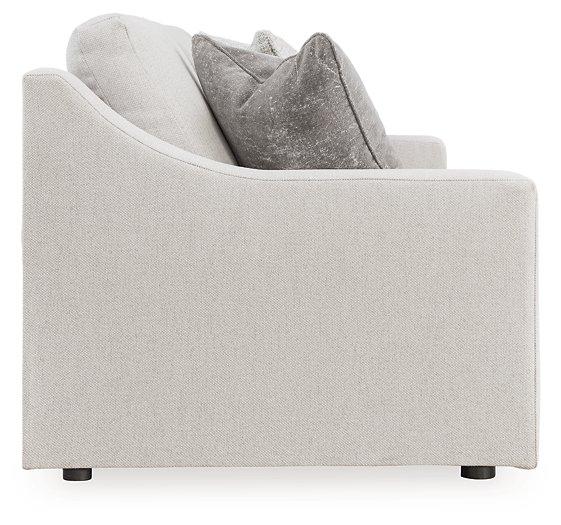 Ashley Furniture Maitelynn upholstery living room set with plush sofas and armchairs in a modern living room setting.